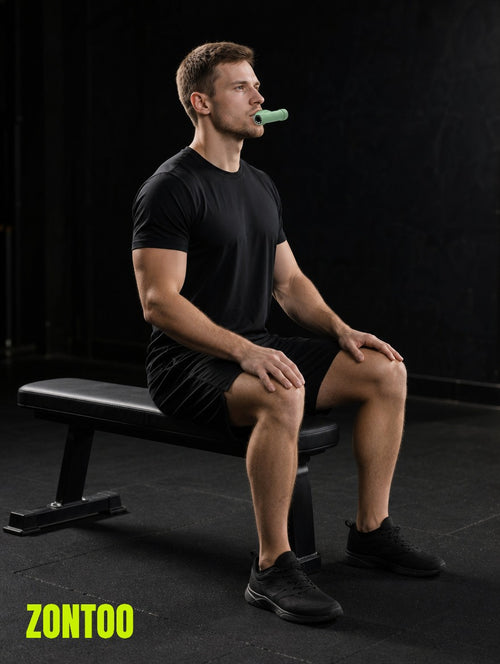 Zontoo Breathing Trainer in use — mouthpiece in, seated inhale